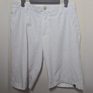 White adidas men's Ultimate365 golf shorts.